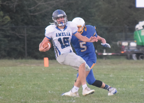 Amelia junior Bobby Wilmouth spins away from a CNE defender in the Barons' victory over the Rockets on Sept. 2, 2016.