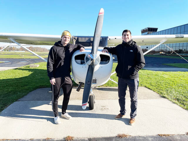 127913475_web1_Joey-Flocarri
Pictured is Joey Floccari (pictured on the left) with instructor AJ Sweatland immediately following his solo flight.