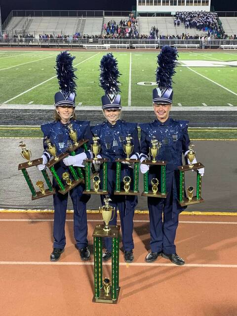 129090875_web1_IMG_4792
Mason Invitational – Grand Champions. Pictured from left to right: Joey Young (junior), Nora Lockhart (senior), and Eli Daniels (sophomore). Photo courtesy Laurie Smith, WC Band Boosters PR Officer.