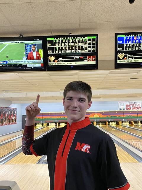 129359615_web1_nolan-littrell-scoreboard
Nolan Littrell points at the scoreboard after bowling a 299 vs. Anderson on Jan. 24, 2023, at Cherry Grove Lanes. Five days later, at Eastgate Lanes, he would throw his first 300. Photo courtesy Nolan Littrell.