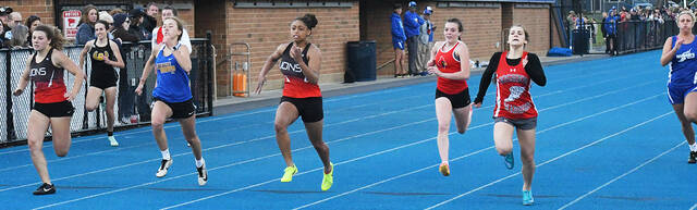 129599858_web1_girls_100
From left to right in the front, New Richmonds Samantha Ringhand, Clermont Northeasterns Anna Best, New Richmonds Lexi Wolf, and Goshens McKenna Dickason sprint toward the finish line in the girls 100-meter dash April 25, 2023, in the Williamsburg Invitational track and field meet at Williamsburg High School. Dickason won the event to lead the Warriors to the girls team title, while Wolf was second, Ringhand third and Best fifth.
