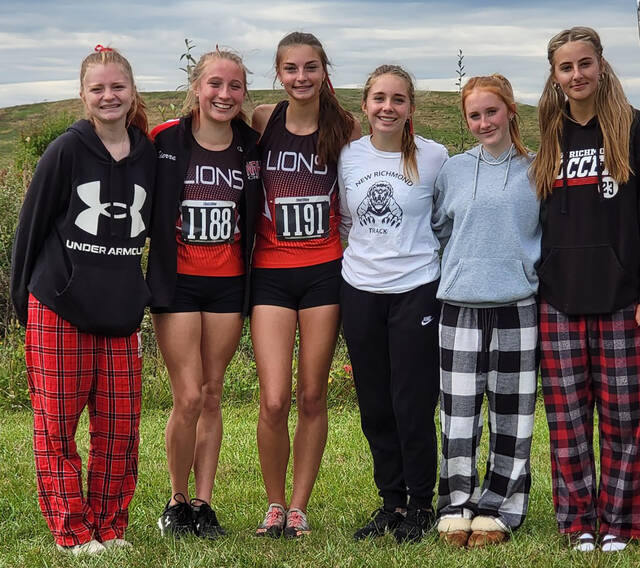 130088091_web1_new-richmond-girls-team
New Richmonds girls cross country team qualified to this weekends Division II regional meet in Troy by placing fifth in the district meet at Voice of America Park in West Chester Township. Team members are, from left: junior Izzy Maloney, senior Sierra Abney, sophomore Elizabeth Hauserman, sophomore Riley Davis, junior Morgan Smith and junior Izzy DuFau. Photo courtesy Garth Shanklin, New Richmond schools.