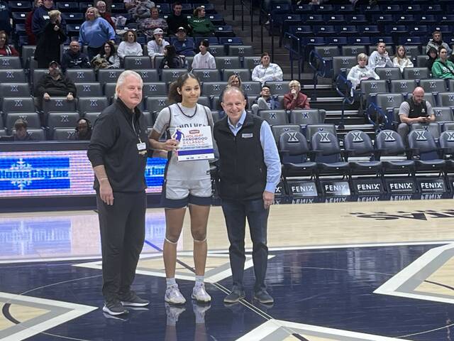 130261858_web1_123023
Layla Hale received the game MVP award after West Clermonts win over Mount Healthy Dec. 28 at Cintas Center. She scored 12 points and had five rebounds. Photo by Dick Maloney.
