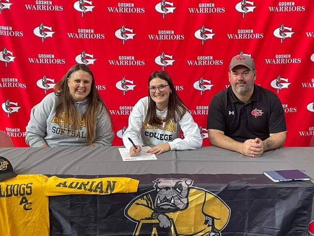 130494206_web1_IMG_8650
McClanahan on signing day with her mom Monica and her dad Justin. Justin is the head coach of the Goshen Warriors.