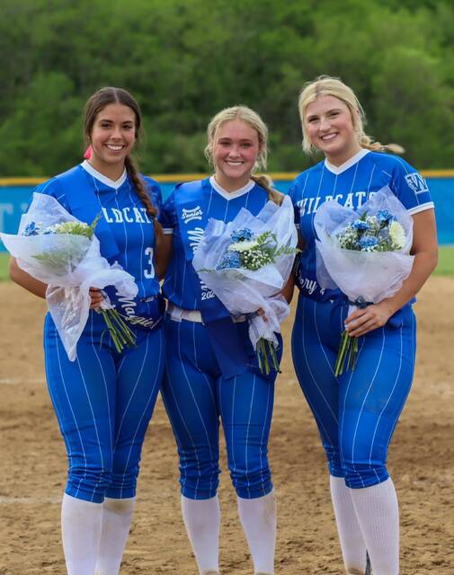 130542346_web1_Burg-softball-senior-day
The Wildcats senior class was honored before a May 1, 2024, win against East Clinton. Pictured, from left, is Maggie Arno, Madi Speeg, and Avery Neth. Photo provided.