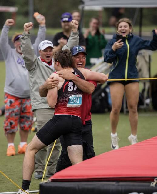 130615395_web1_IMG_1944
Grant Harrison hugs his dad after breaking the DII state pole vault record during districts on May 15, 2024. Photo provided.
