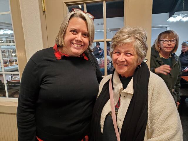 131133539_web1_20241205_191905
Congressman Greg Landsmans Liaison Melissa Hoin, on left, and U.S. Navy veteran Michele Pennington, on right, pause following the conclusion of the Fourth Women Veterans Dinner/Discussion held at the Golden Corral Restaurant. The dinner was co-sponsored by the Disabled American Veterans (DAV) Department of Ohio and DAV Chapter #63 (Clermont County). The discussion on pertinent female veterans issues was conducted by DAV National Headquarters Staff Elizabeth DePompei and Elizabeth Stetler. Photograph provided by DAVA Unit #63 Commander Shirley Plahovinsak.