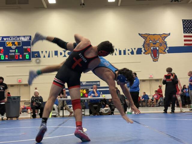 131158280_web1_carson-kessen-138
Senior Carson Kessen lifts Williamsburgs Aiden Daniel during a match at 138 pounds, which Daniel won. Kessen would place third in the tournament. He was second in the Southern Buckeye Athletic and Academic Conference tournament last season at 132 pounds. Photo by Ethan Baughn, Goshen High School.