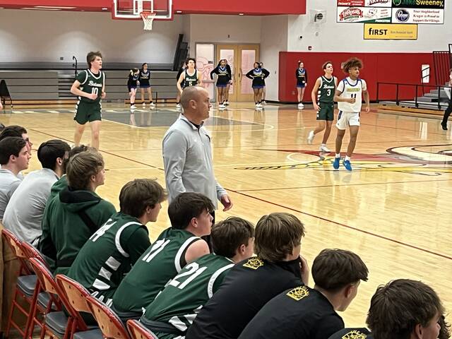 131317365_web1_aaron-brose
Batavia coach Aaron Brose guides his team from the sideline during Saturdays Division III district tournament game vs. Northwest at Princeton. Photo by Dick Maloney, Sun Sports Correspondent.