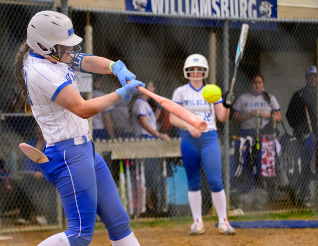 131404538_web1_Williamsburg-vs.-Whiteoak-Softball Williamsburgs KK Pollitt makes contact with a pitch during a non-conference game March 27, 2025, against Whiteoak at Williamsburg High School.