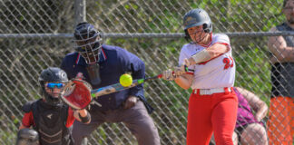 
			
				                                New Richmond’s Rae Hartigan makes contact with a pitch thrown by Goshen’s Skye Shaw during the first inning of an American Division game April 23, 2025, at Goshen High School.
                                 Photo by Sun Sports Reporter Jake Dowling

			
		