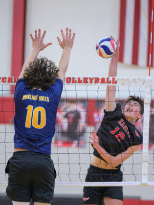 Milford’s Bryce Fielman (12) kills the ball over the net during an Eastern Cincinnati Conference match May 1, 2025, against Walnut Hills at Milford High School.
Photo by Sun Sports Reporter Jake Dowling