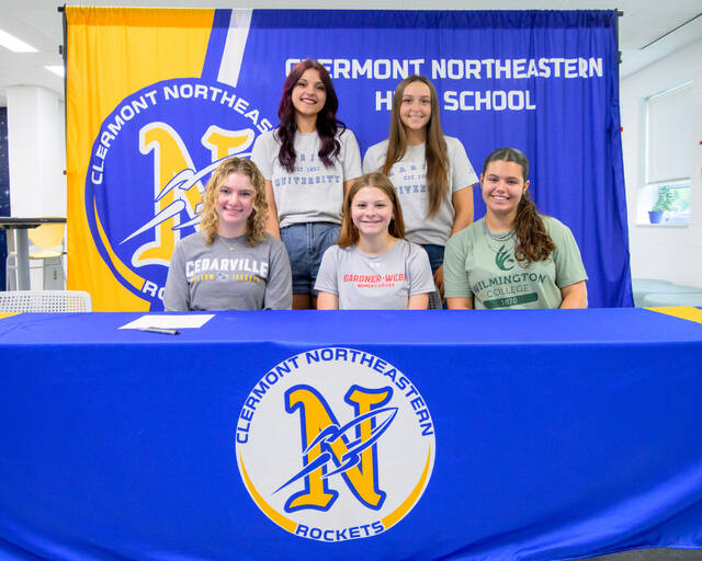 131504232_web1_CNE-College-Signings Five Clermont Northeastern student-athletes signed to continue their athletic careers May, 8, 2025, at CNE High School. Pictured, front row, left, Savannah Faith Pennington, cheerleading, Cedarville University; Ellie Breitenstein, soccer, Gardner-Webb University; and Carla Evans, cheerleading, Wilmington College. Back row, left, Aryanna King, soccer, Marian Universitys Ancilla College; and Aubrey Rack, soccer, Marian Universitys Ancilla College. Photo by Sun Sports Reporter Jake Dowling