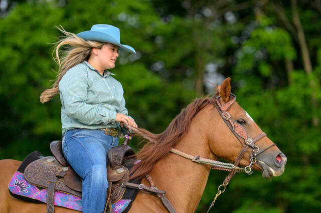 131582278_web1_Brenna-Shepherd-2
Goshen Junior High School student Brenna Shepherd takes her horse, Fred, for a run June 12, 2025, at their Pleasant Plain home. Shepherd and Fred will compete June 22-28 in the National Junior High School Finals Rodeo in Des Moines, Iowa.
Photo by Sun Sports Reporter Jake Dowling