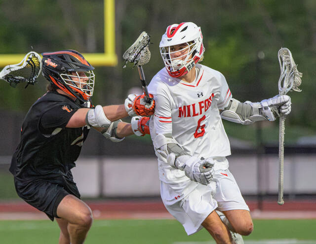 131601052_web1_Loveland-at-Milford-Boys-Lacrosse-3 Milfords Clay Barkimer (6) rushes up the field during an Eastern Cincinnati Conference boys lacrosse match May 6, 2025, against Loveland at Eagle Stadium Powered by Cullen Electric in Milford. File photo by Sun Sports Reporter Jake Dowling