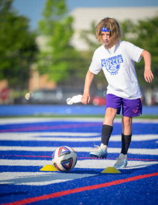 Sawyer Stahley passes the ball during a session at the Williamsburg Soccer Camp on June 24, 2025, at Ken Osborne Field at Abrams Stadium in Williamsburg. Photo by Sun Sports Reporter Jake Dowling