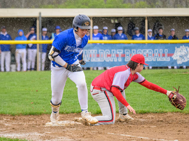 131636068_web1_Bethel-Tate-at-Williamsburg-Baseball
Williamsburgs Aaron Hatter, left, beats out a throw to first base during a National Division game April 9, 2025, against Bethel-Tate at Williamsburg High School. The National Federation of State High School Associations announced rules changes, including a double first base beginning in 2027.