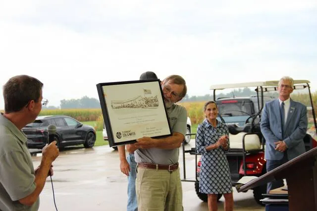 Former Director Dave Anspach was honored for his 21 years of service on the Board of Supervisors. Photo courtesy Clermont Soil & Water.
