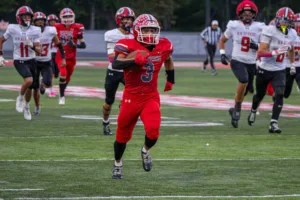 			
				                                Goshen’s Jomar Berg returns the opening kickoff for a touchdown in the first quarter of a Southern Buckeye Athletic and Academic Conference American Division game Oct. 2, 2026, against New Richmond at George Rise Field at Jim Brown Stadium in Goshen.
                                 Jake Dowling/The Clermont Sun

		